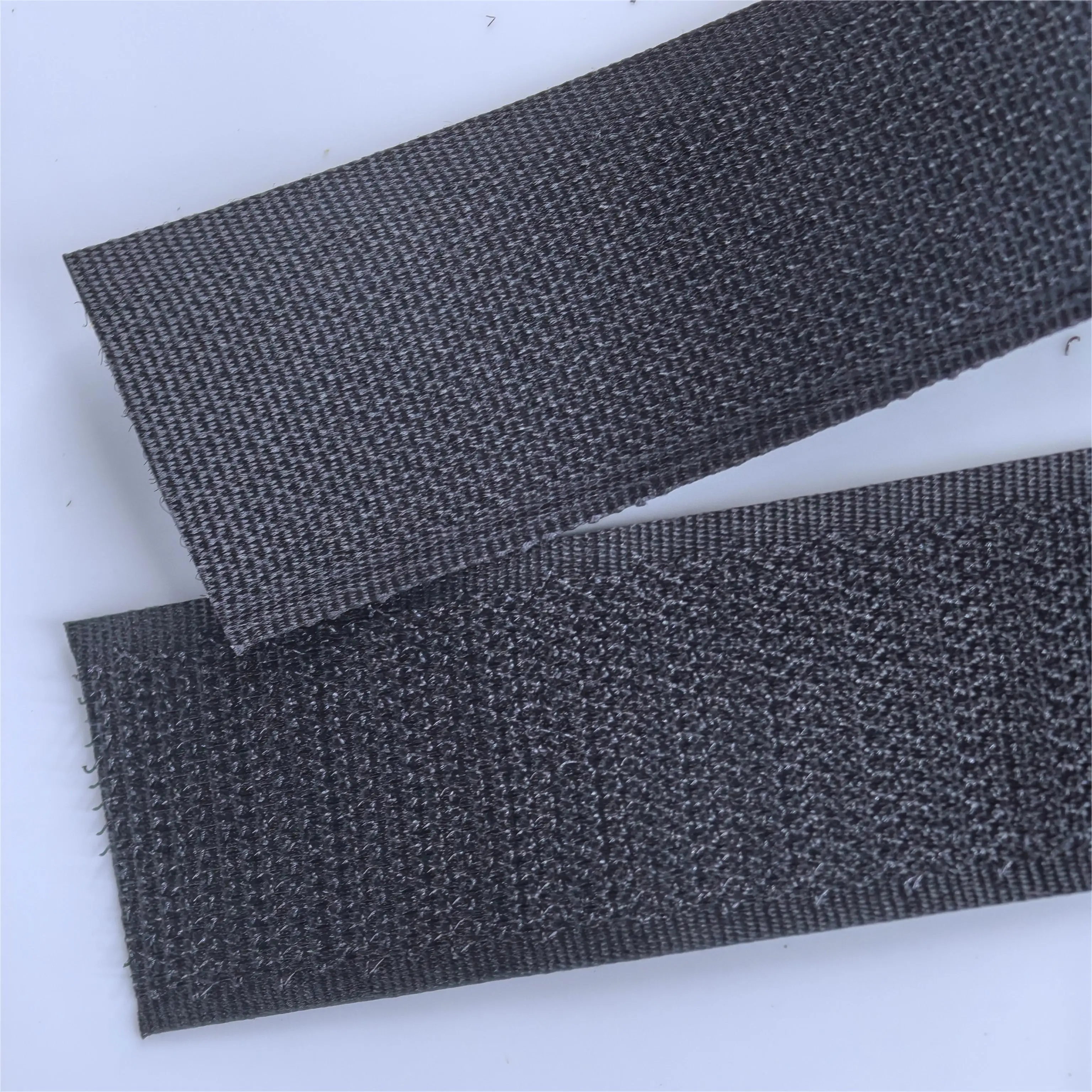 Industrial Strength Interlocking Tape Hook and Loop Stretch Fastener