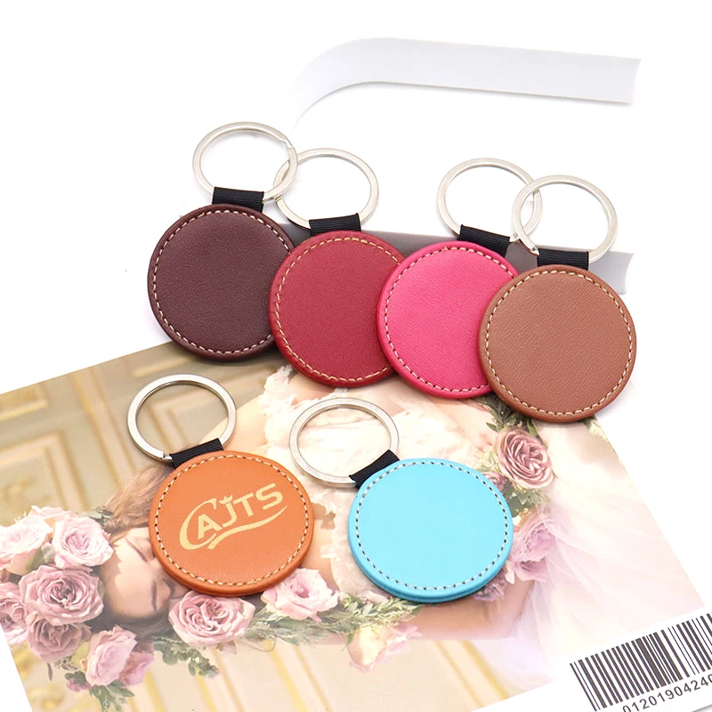 Wholesale Custom Plain Luxury Faux Leatherette Round Shape Car Personalized PU Blank Leather Keychains for Laser Engraving