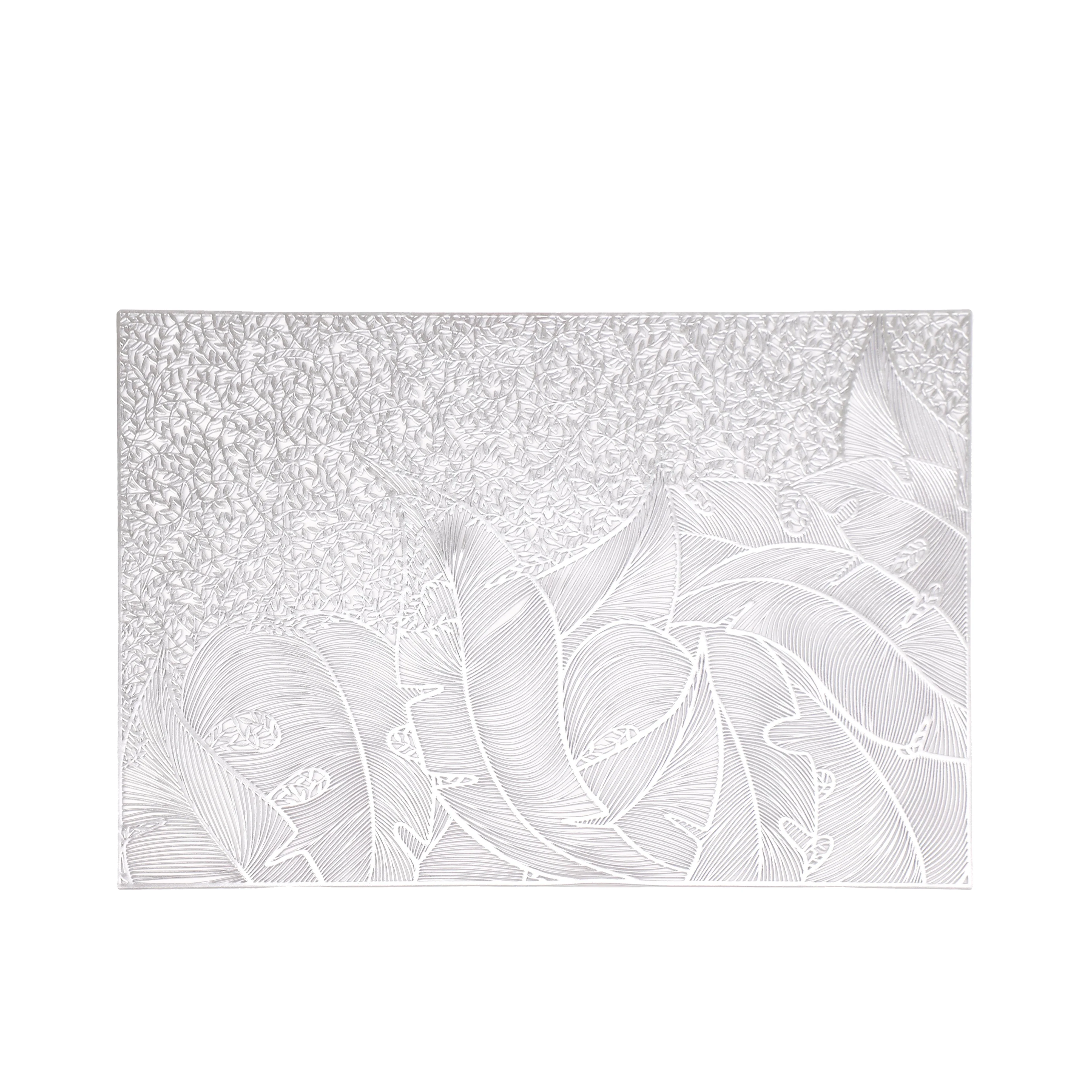 Silver seagrass hollowed out foil placemats can be customised for wholesale use in other settings such as restaurants