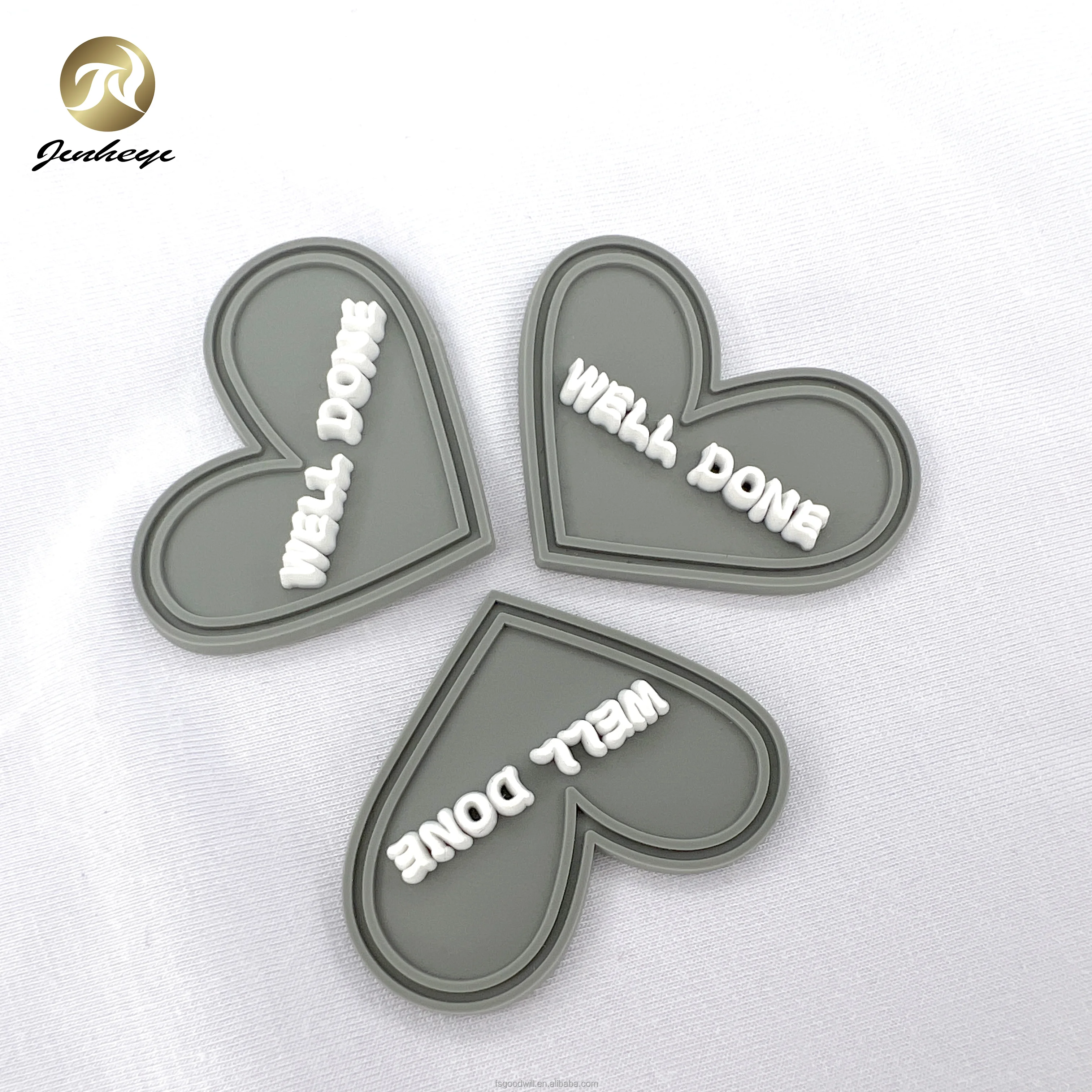 Custom Heart Shape Gary With White Embossed Logo Rubber Patches Logo Sew On Logo For Clothes