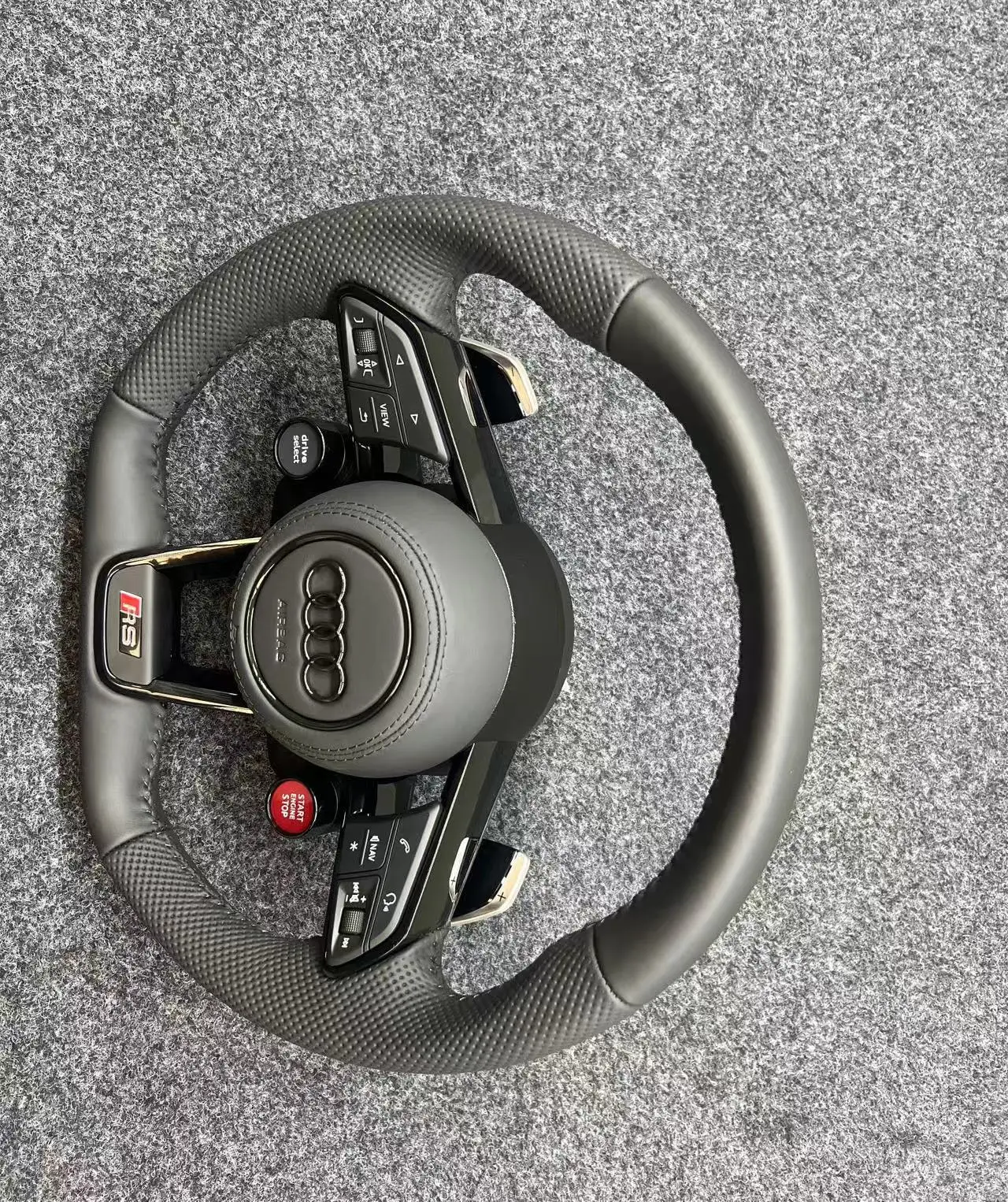 The Audi R8 steering wheel assembly upgrade R8 button sport mode is suitable for all new and old models