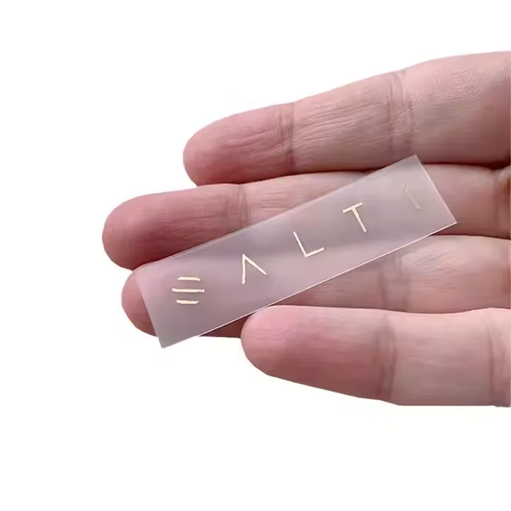 Heat Transfer Gold Stamping Tpu Care Label Custom Logo Printed Low MOQ Translucent Tpu Clothing Label