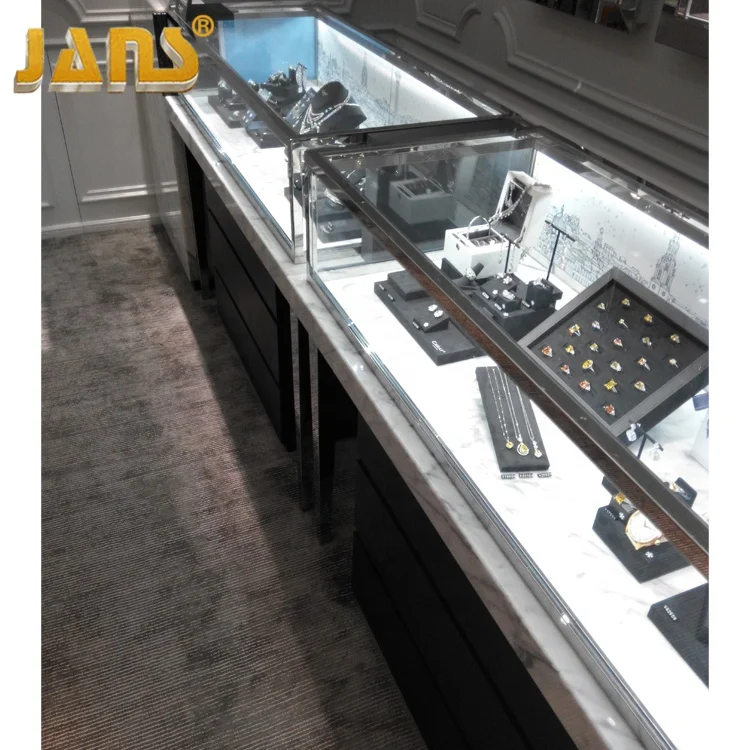 
Luxury high-grade marble curved glass jewelry display cabinet showcase with LED light 