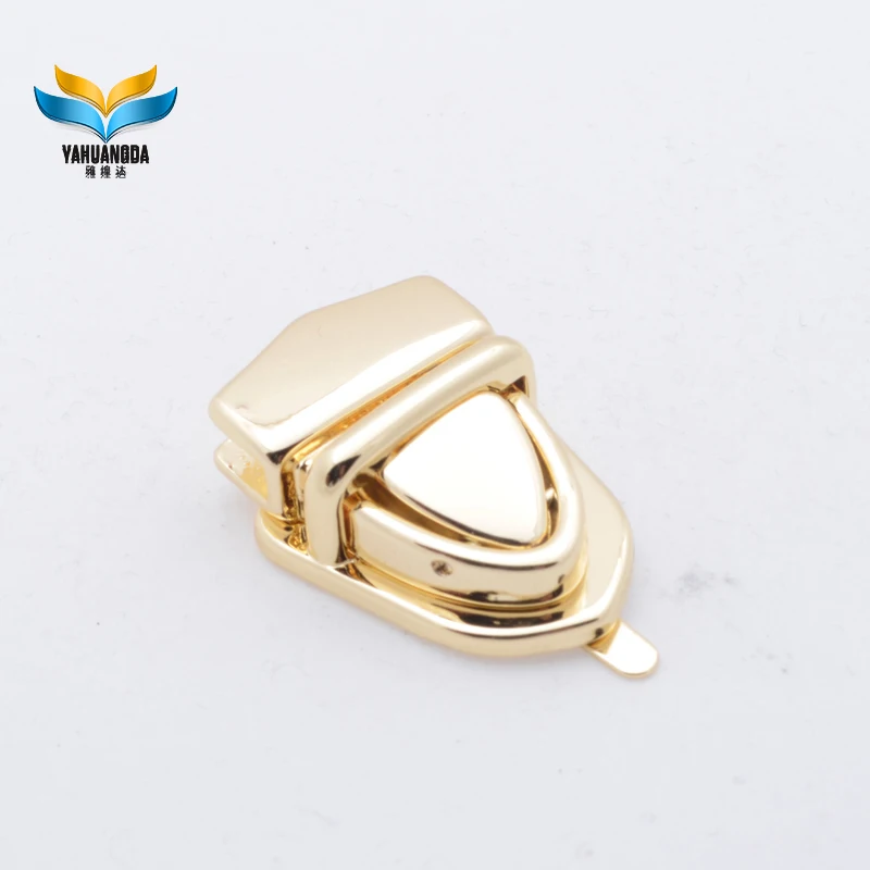 hot selling customized zinc alloy die casting plate lock light gold plating  push  lock  for handbags