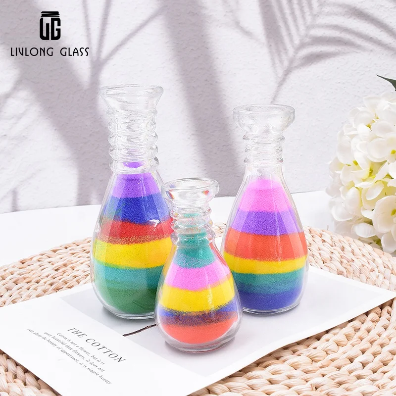 Customize a series of 40 ml to 240 ml clear decorative art  sand  glass bottle
