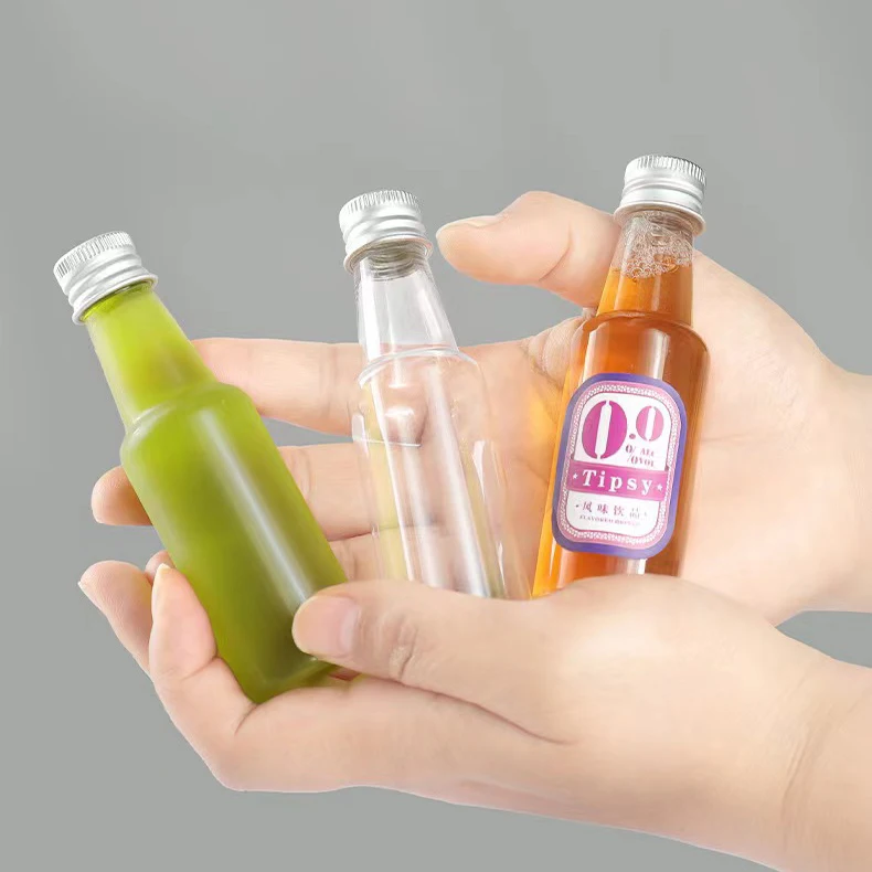 Wholesale 50ml Mini Small Sample Alcohol Juice Drinks Plastic Wine bottle Liquor Plastic Bottle With Screw Lid for Sale
