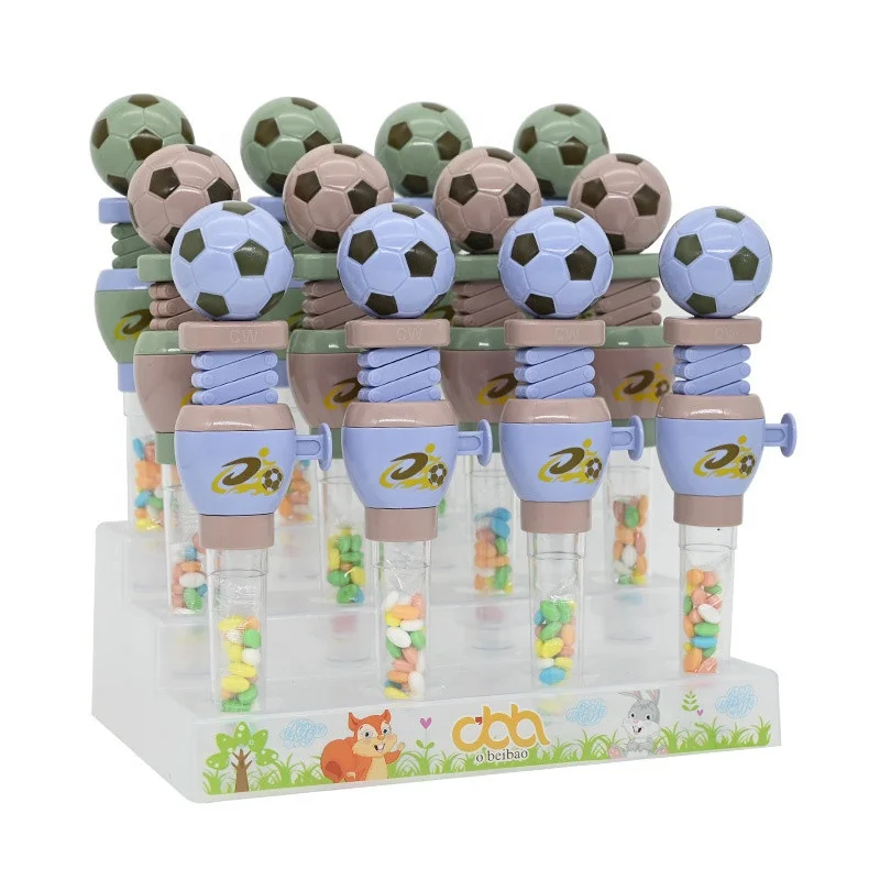 Hot sale Telescopic Spring Manipulator soccer Toy candy novelty football sugar tube Parent kids interactive sport candy toy