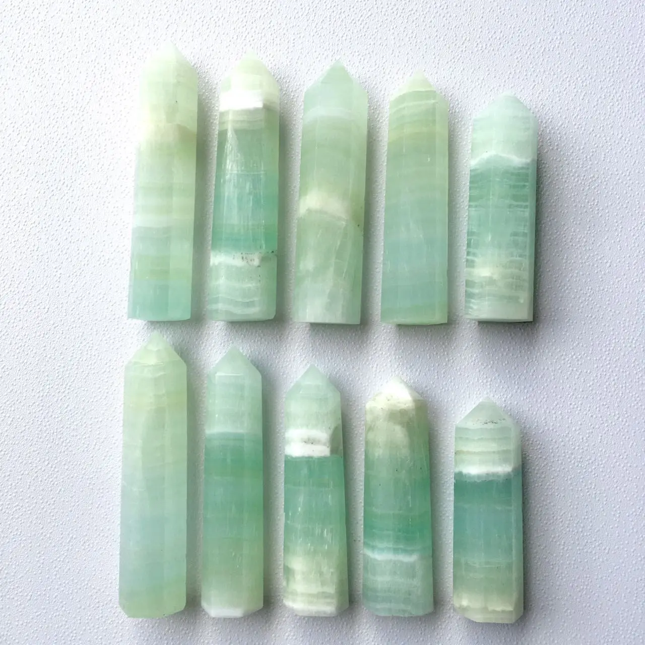 Natural Stone High Quality Green Caribbean Calcite Tower Crystal Point Healing Stone For Decoration