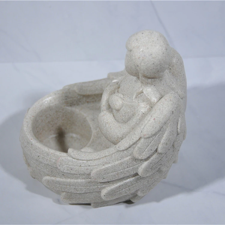 Whole sale resin candle holder figurine with led candle