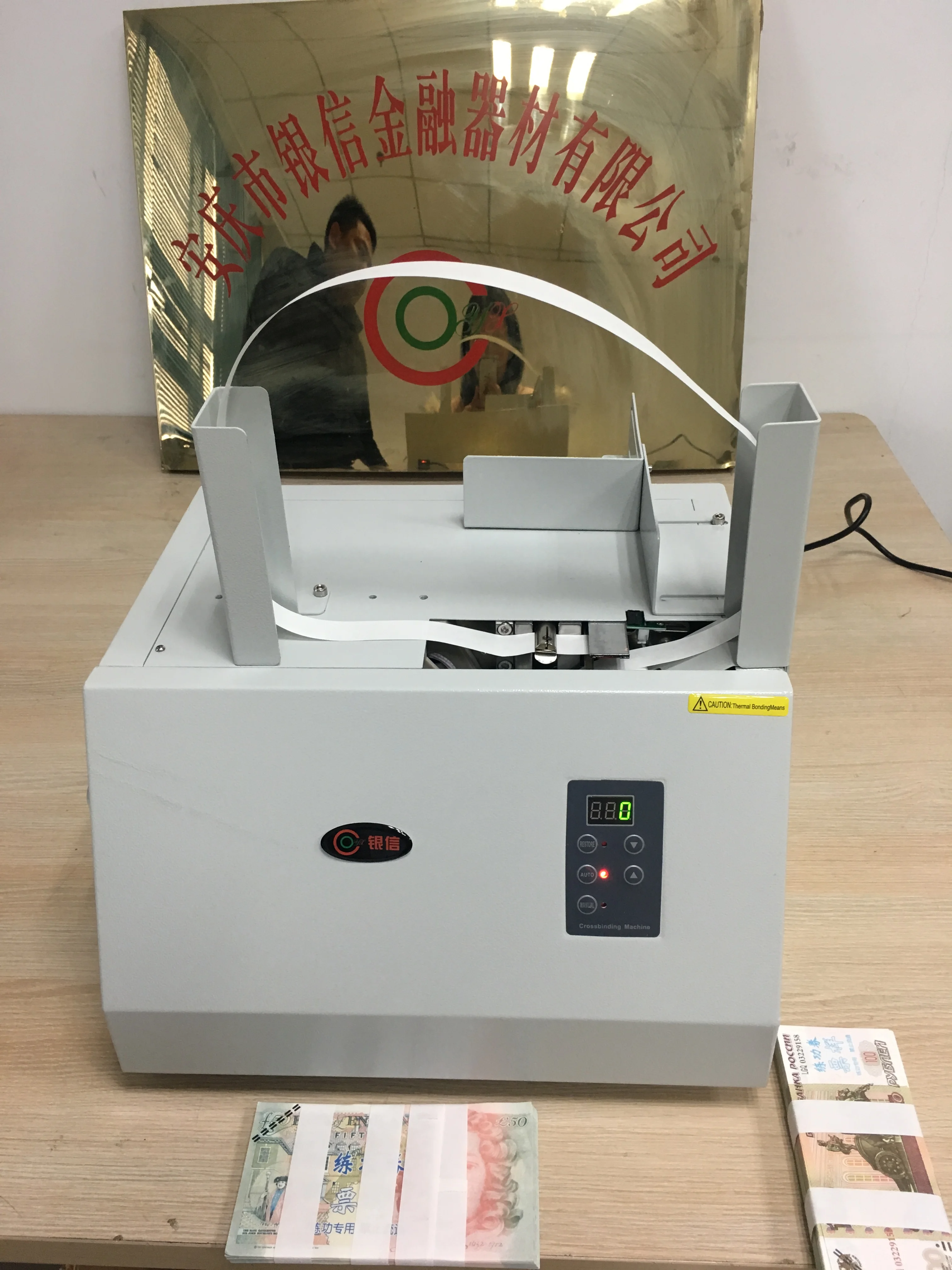 Automatic paper packaging machine banding cash money notes machine hot melt strapping tape machine