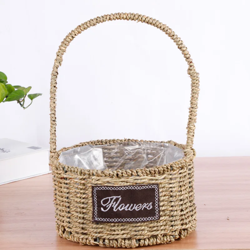 handmade straw braid woven flower basket with plastic liner/wholesale straw grass rope flower gift basket with plastic liner