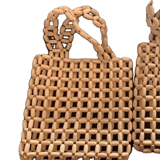 Wholesale Large Beach Hand Bag 2021 Summer Wood Bead Hand Weave Hollow Out Lady Casual Beaded Handbag