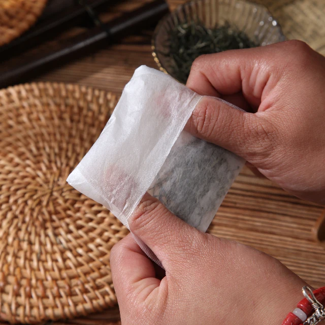 Factory Hot Sale Biodegradable Non-woven Fiber Reflexed Teabags Folding Corn Fiber Tea Bag 7*9cm Tea Filter Bag