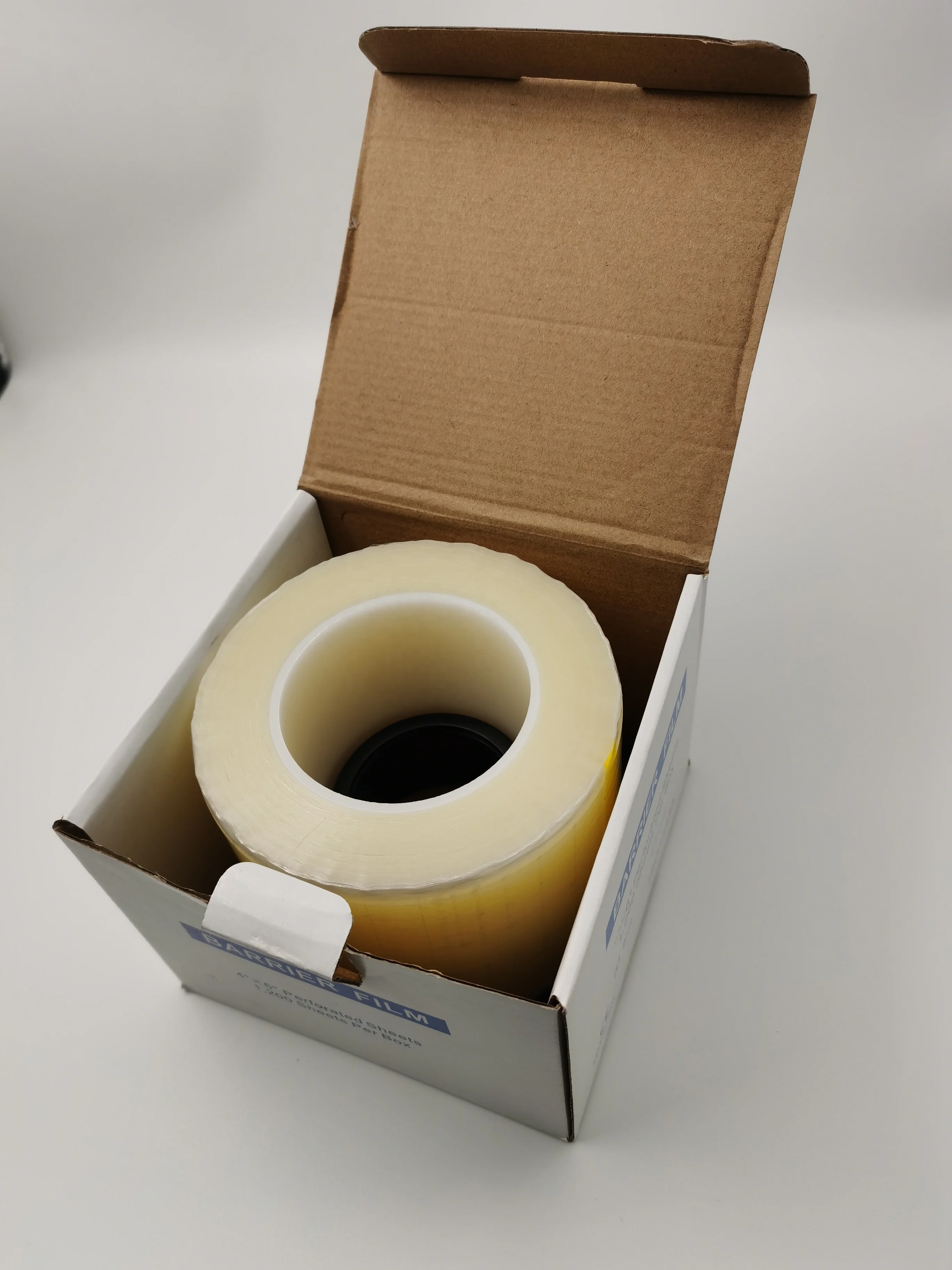 disposable dental medical plastic PE barrier film Polyethylene self-adhesive backing perforated sheet roll handy sticky tape