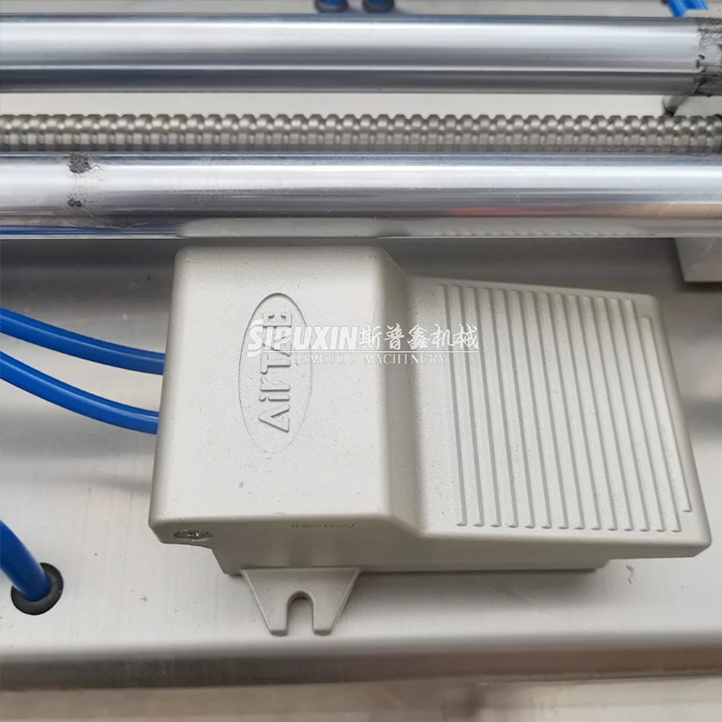 Spx High Quality Manual Liquid Juice Horizontal Automatic Sauce Filling Machine Medicine Filling Machine