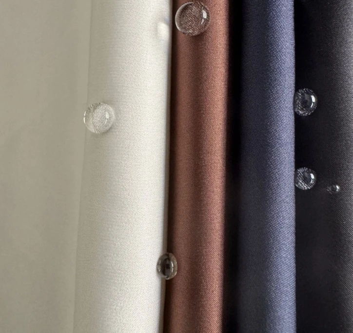 High density cotton Pongee 15D 25D 30D satin fashion down jacket fabric three anti-ironing film no bile anti-velvet