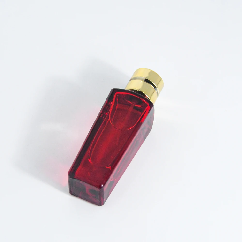 High quality new empty oil perfume atomizer oil spray red glass bottle perfume spray bottle 50ml