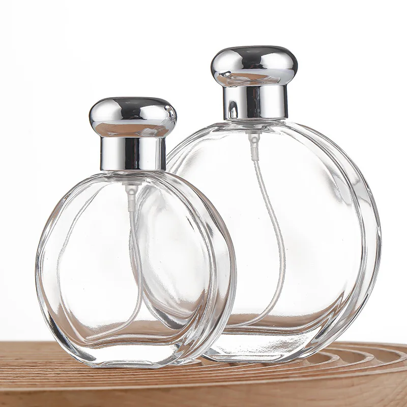 Transparent Flat Round Perfume Bottle 50ml 100ml Crimp Fragrance Glass Bottle with Atomizer