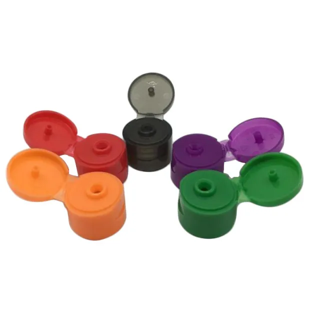 stock available 18mm 20mm 24mm 28mm 38mm  plastic flip top cap for skincare cosmetics packaging