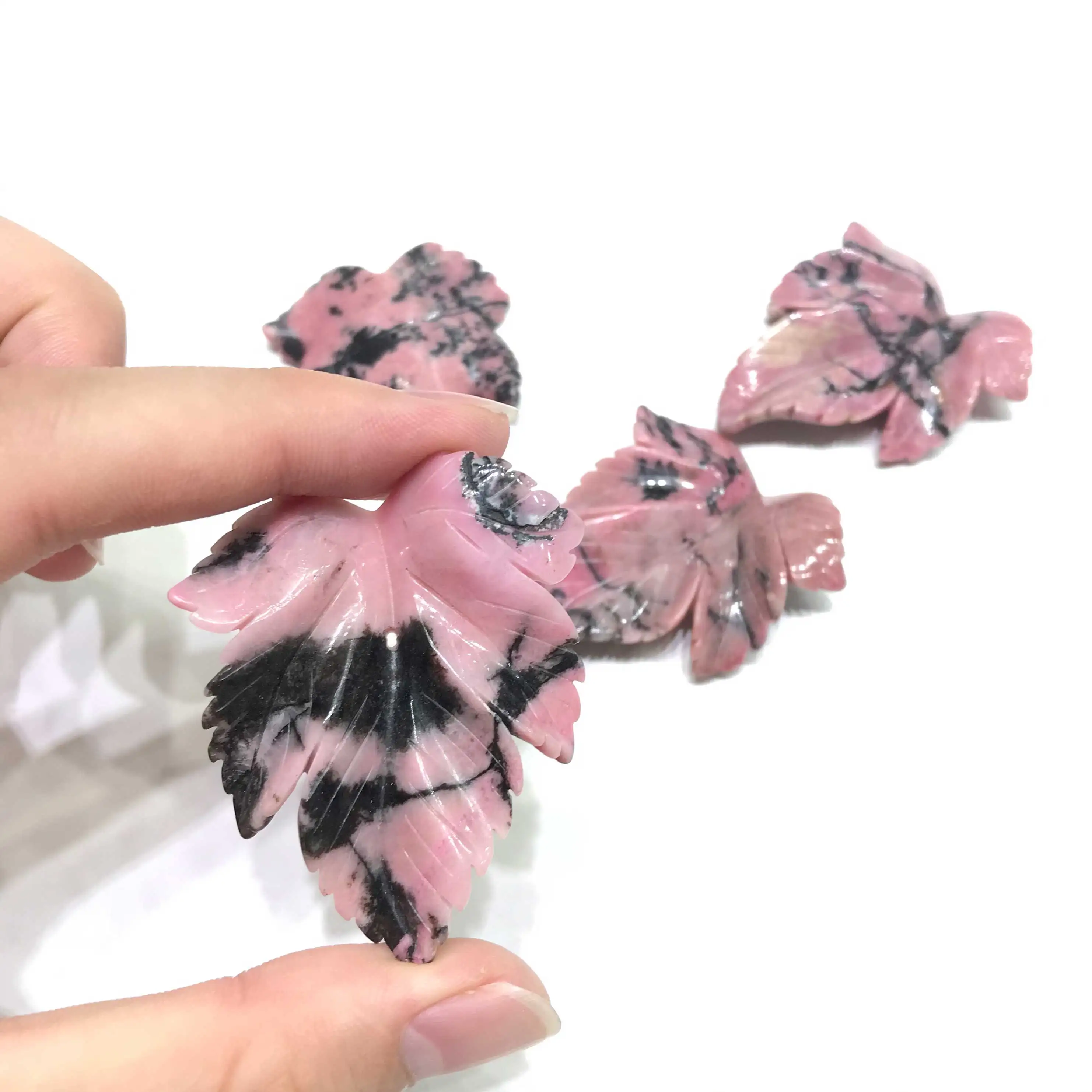 Natural Hand Carved Black Pink Rhodonite Crystal Leaf Carvings With Hole For Gift Decoration