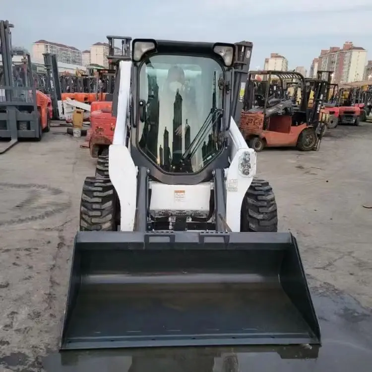 Подержанный высокомощный скользящий погрузчик Bobcat S750 с грузоподъемностью 1 4 тонн продается дешево а S70