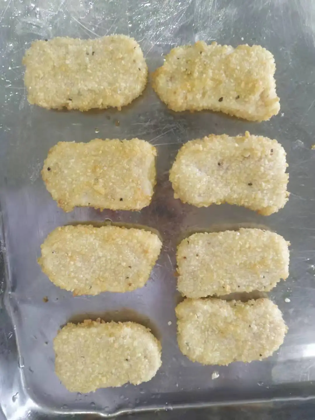 Замороженные куриные nuggets полностью приготовленные