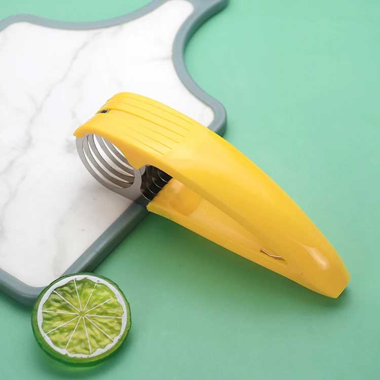 Fruit and vegetable salad peeler cutter kitchen equipment for bananas in stainless steel with a plastic grip