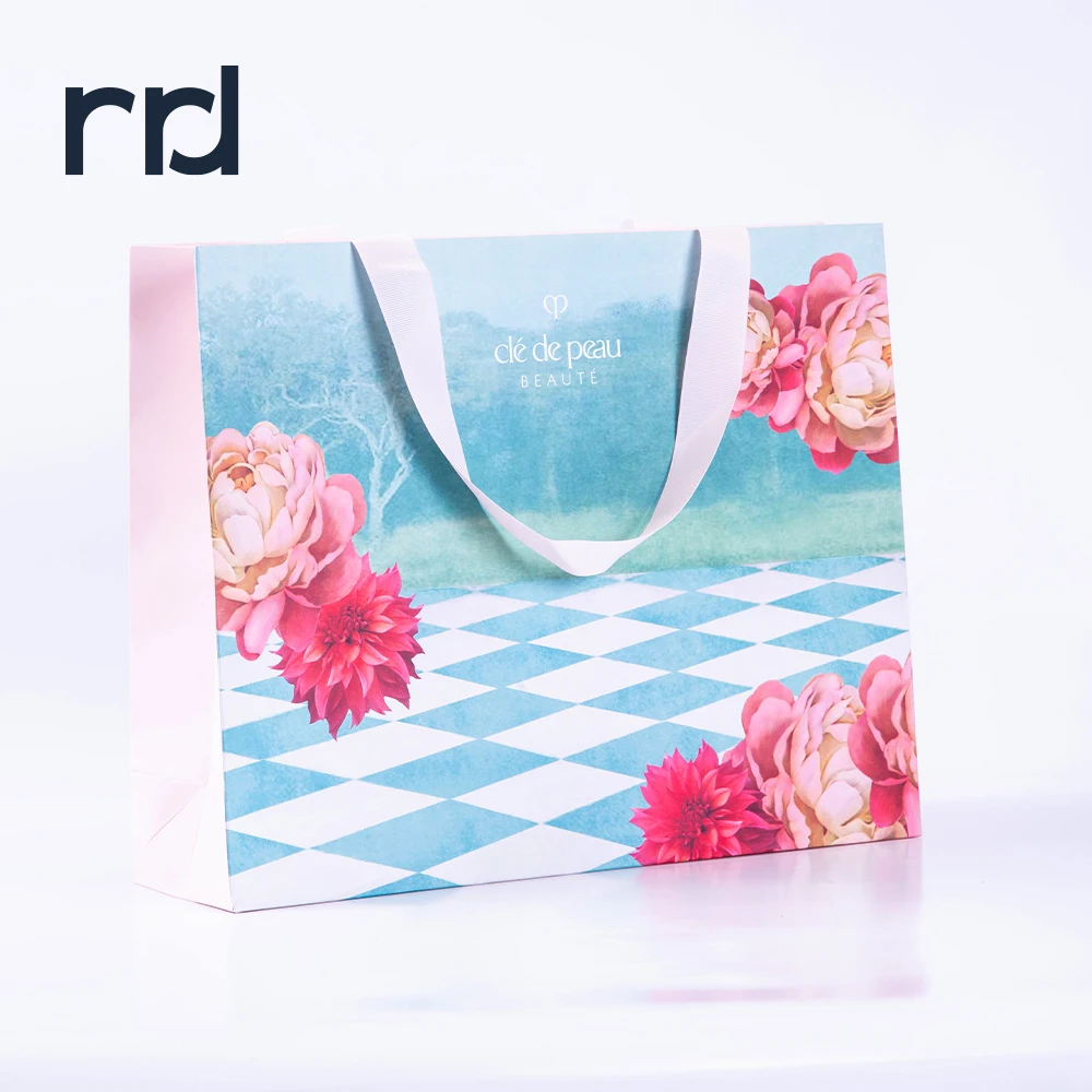 RR Donnelley Luxury Custom Printed Logo advanced sense of delicate flowers wrapped Birthday Party Paper Gift Bags with Handles