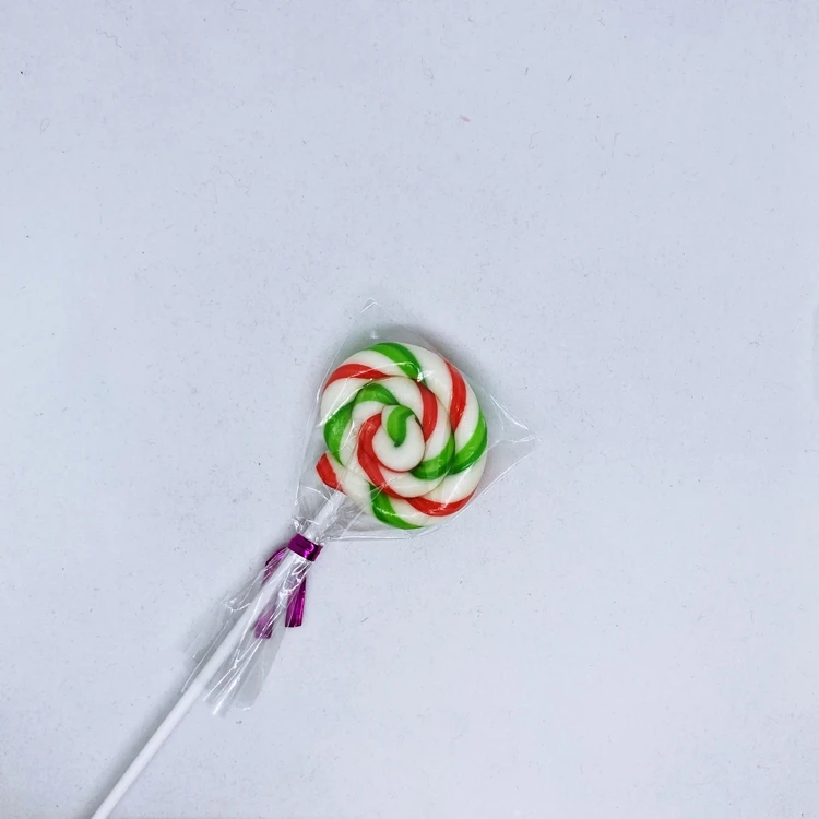 Конфеты, круглые красные и зеленые леденцы, желейные палочки, конфеты