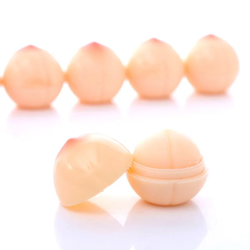 RTS Cute Organic Fruit Honey beeswax OEM cosmetic lip balm Round private label Hydrating Lip Balm ball natural custom logo