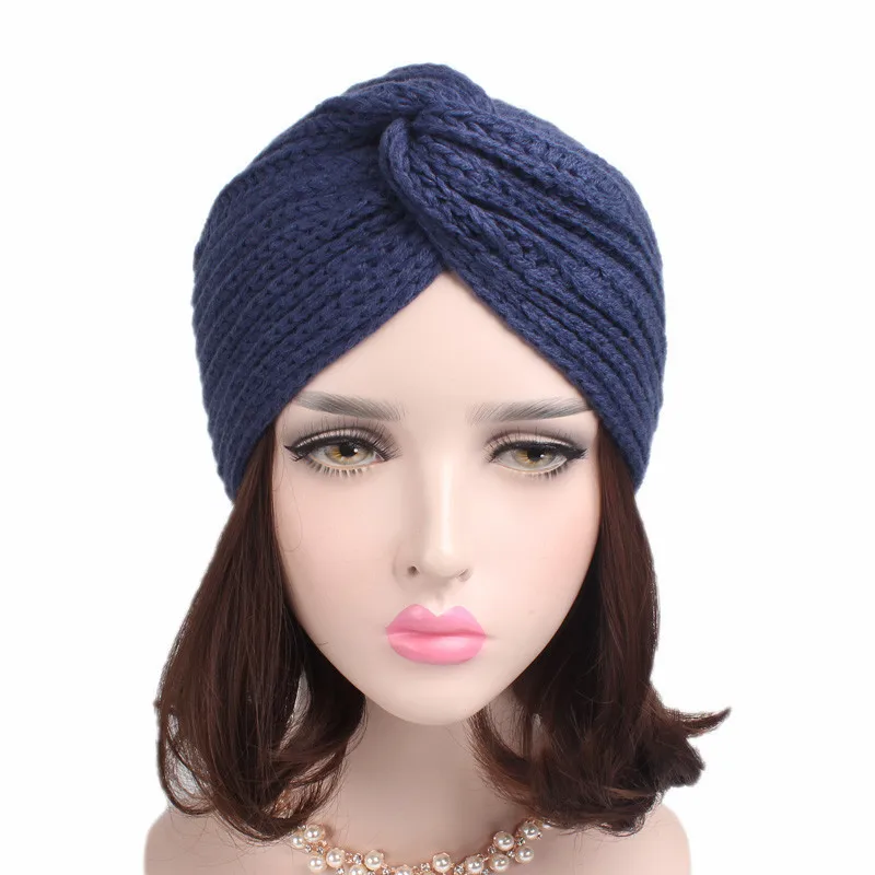 
New design high quality personality wind warm knitted cross twisted woolen hat 