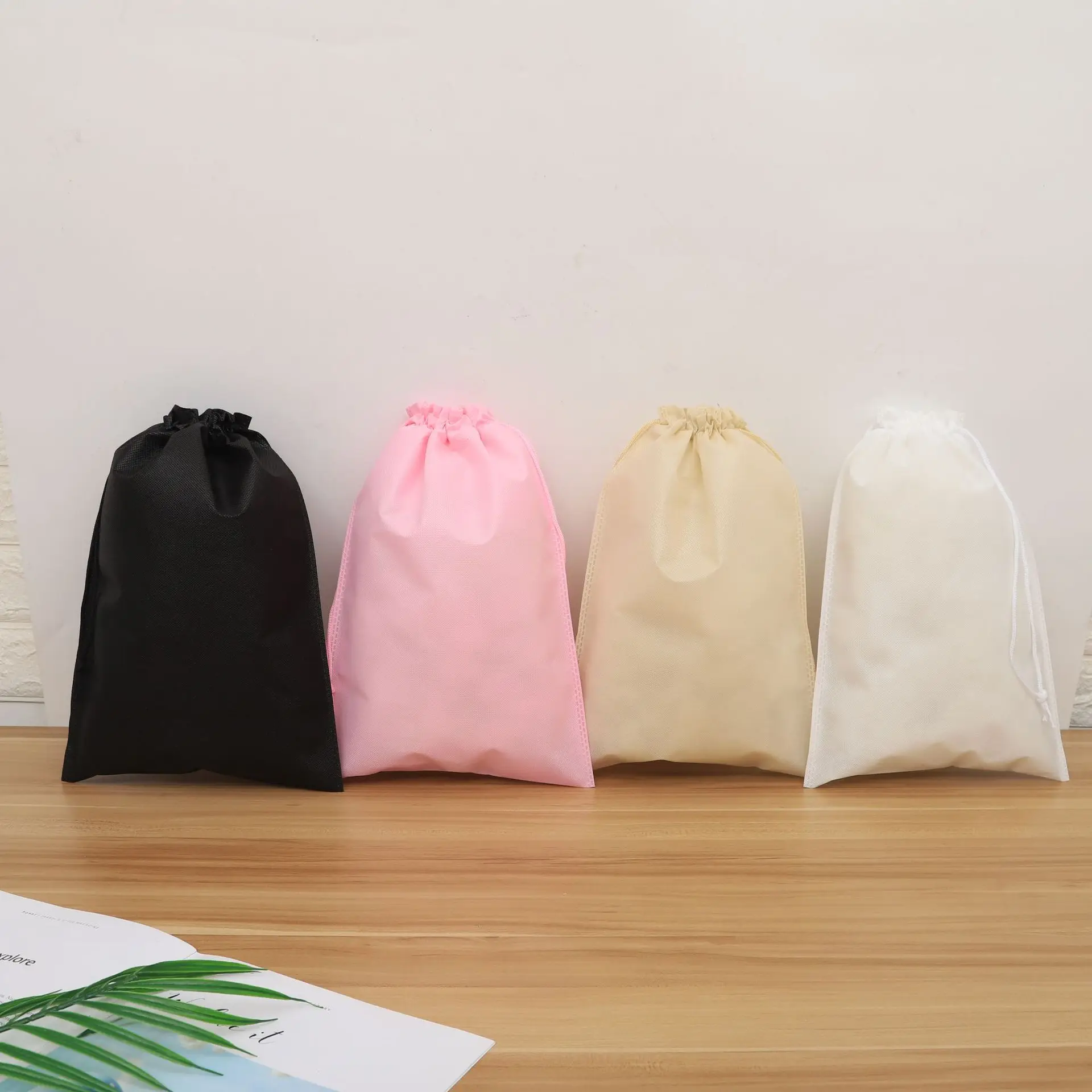 Wholesale reusable non woven printed drawstring hotel laundry bag/promotion eco-friendly cheap non-woven travel laundry bag