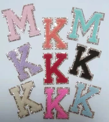 Embroidered letters with gold glitter background in variety chenille colors for bags and clothes