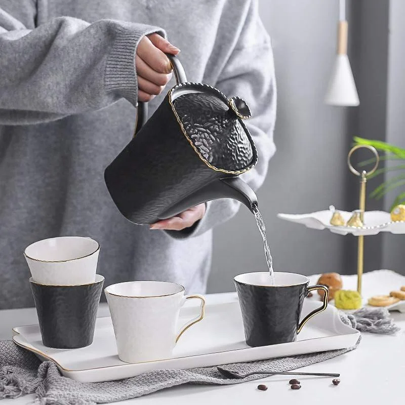 Luxury European Design Bone China Tea Set In Black And Gold Relief Ceramic Coffee Set Tea Set Manufacturer