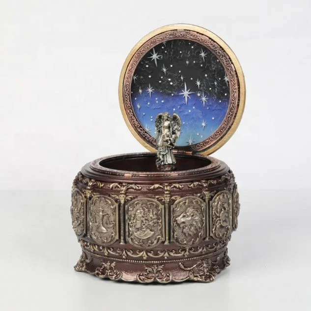 Lighting and rotation battery operated music box