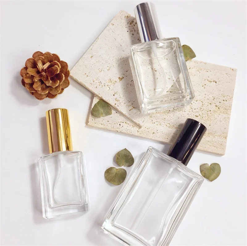 Factory price square clear perfume bottle 30ml 50ml 100ml glass, silver gold screw sprayer cap with logo printing black white