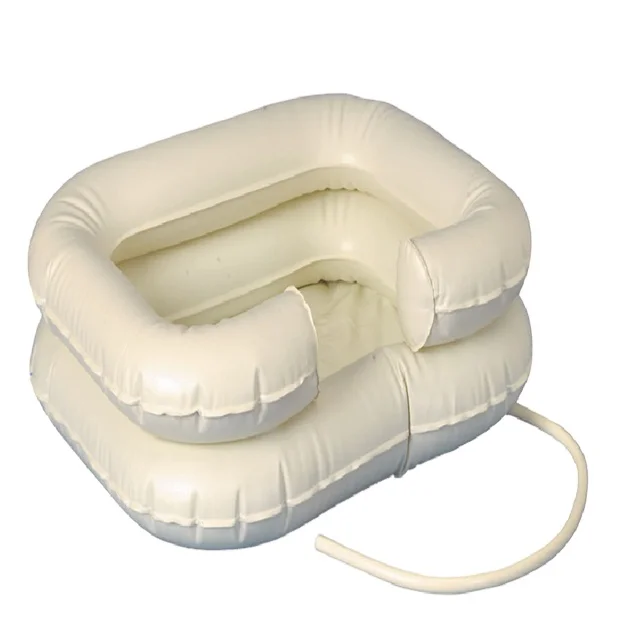 Inflatable bedside shampoo washbasin with head support for sick people disabled in hospital