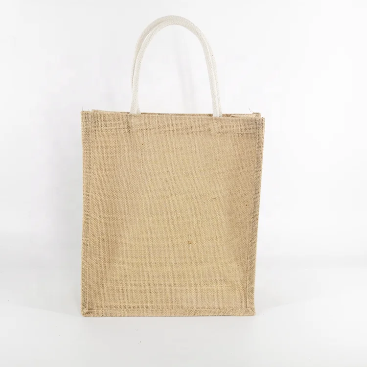 
Slip cotton round rope handle upright to carry a reusable sack jute bag for shopping 