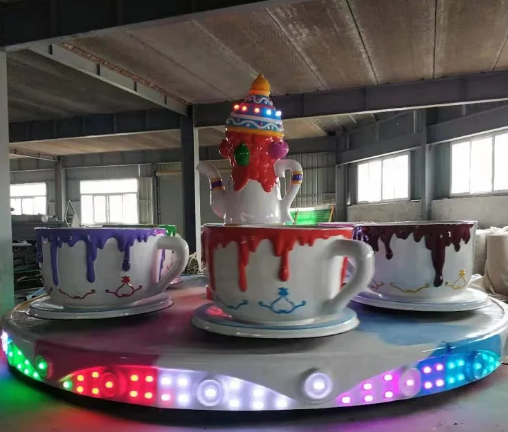 kiddie ride machine coffee cup merry go round amusement ride