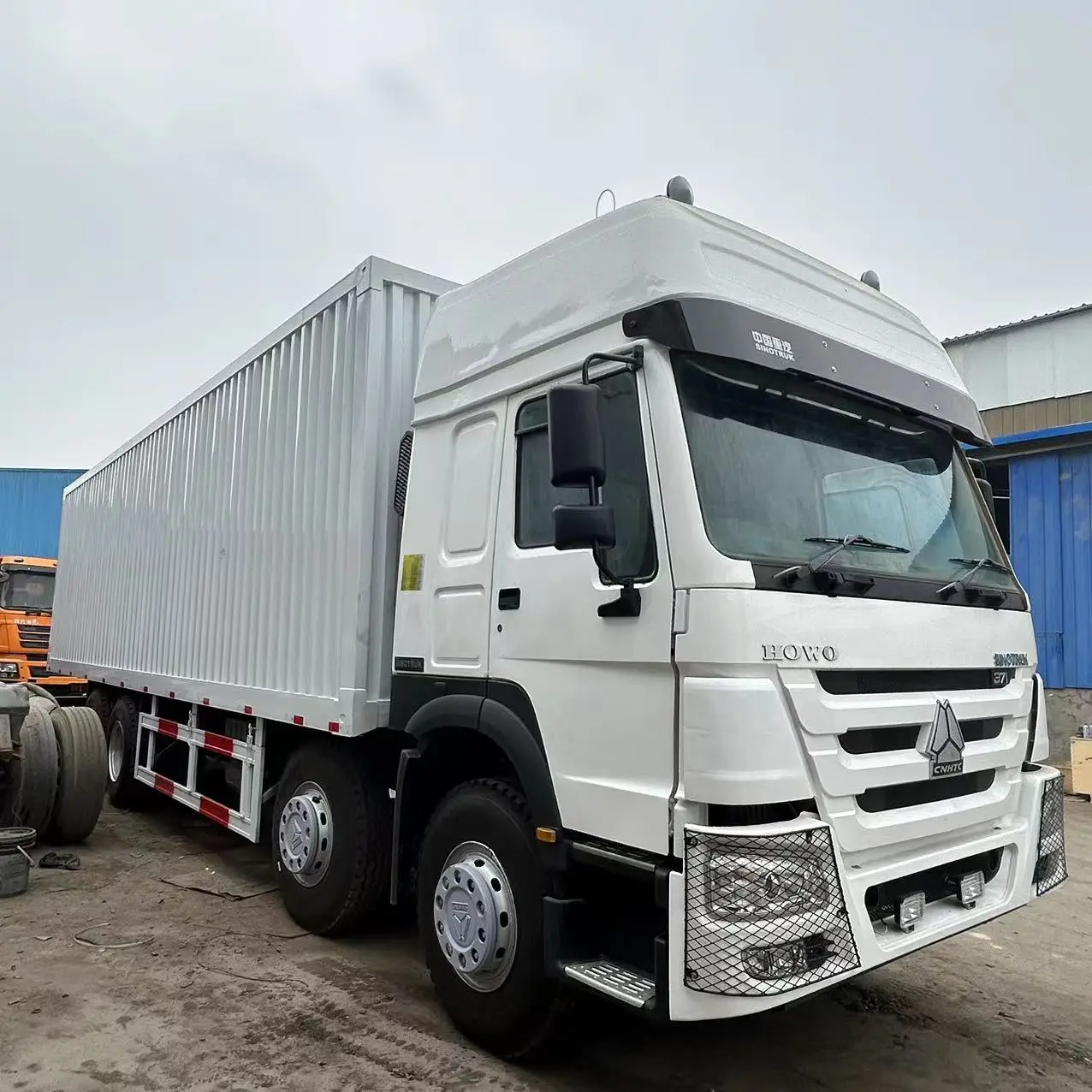Б/у sinotuck Howo 8x4 контейнеровоз в Китае
