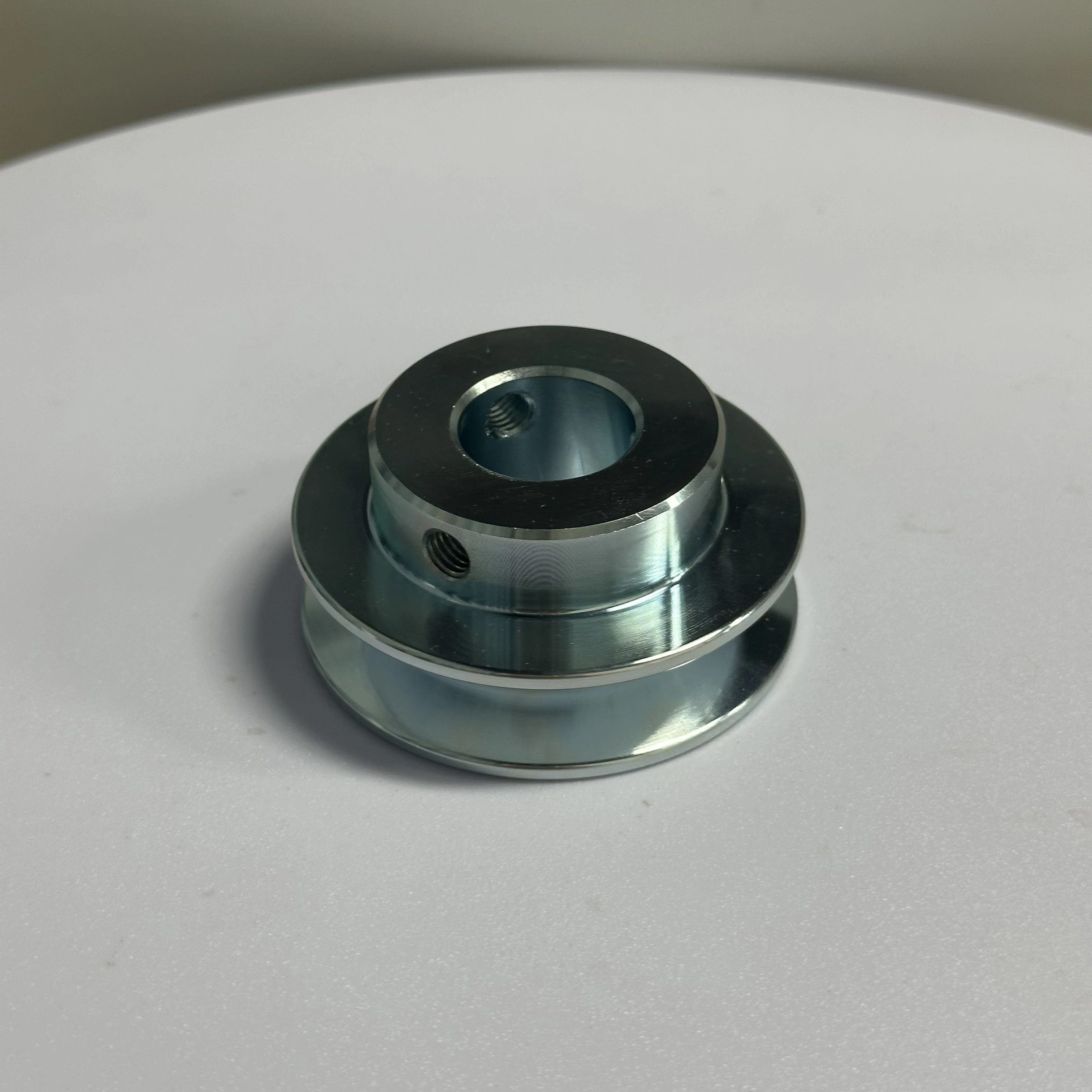 OEM/ODM Heavy Load High Quality Wear-resistant C45 Steel Zinc Plated Timing Belt Pulley without Teeth