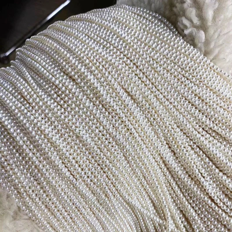 China cultured natural freshwater pearl string beads wholesale pine round white freshwater pearl for jewelry making