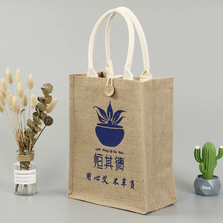 
Factory Wholesale Custom LOGO Hessian Jute Cloth Tote Bag Wooden Buckle Jute Burlap Gift Bags Shopping Tote Bag 