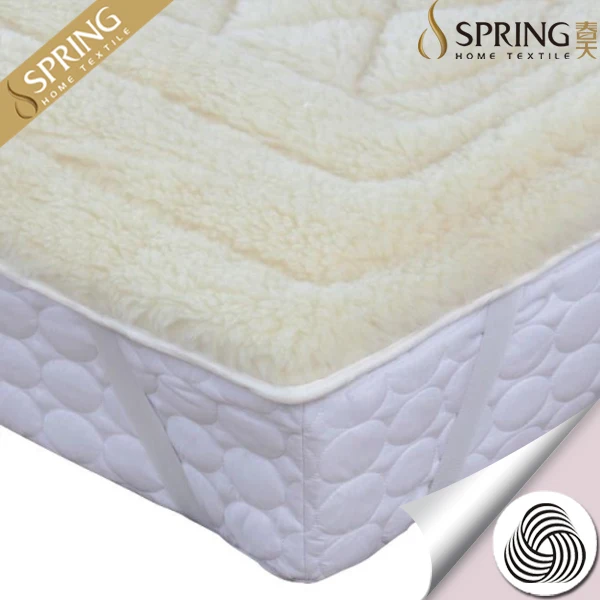 China wholesale FR cotton quilted flame retardant fiber Wool fleece mattress toppers with elastic stripes on four corners