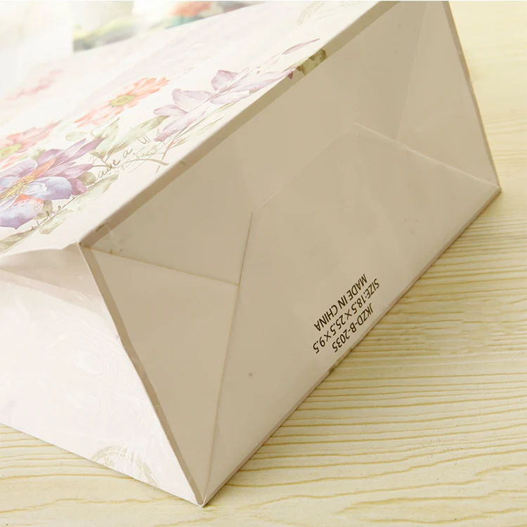 
hot seller eco-friendly machine made kraft paper carrier bag wholesales manufacturer 