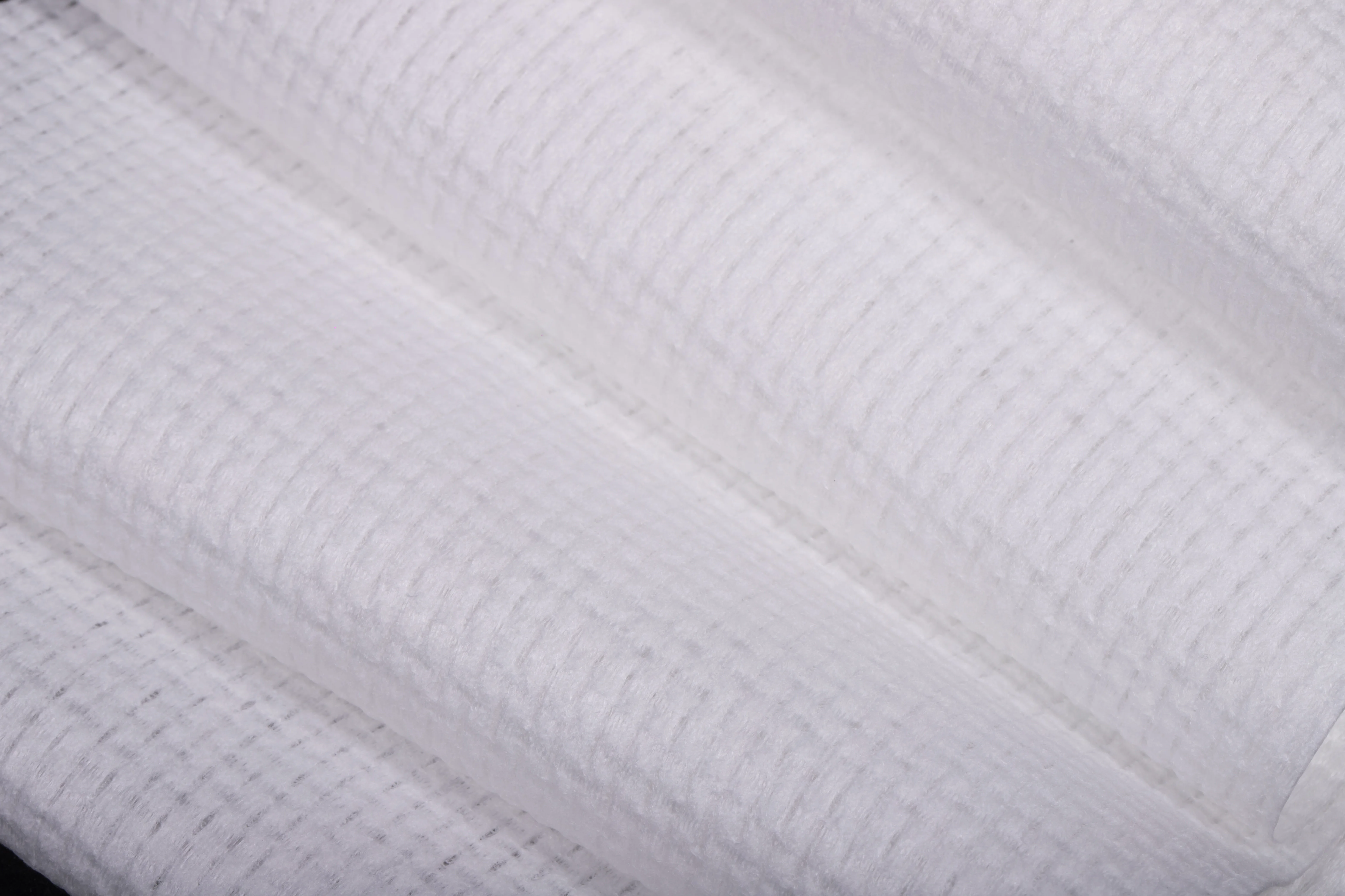 Polyester Non-Woven Fabric Roll Water Spunlace Non-Woven Fabric Wet Tissue Paper Material Soft Thin Surface Skincare