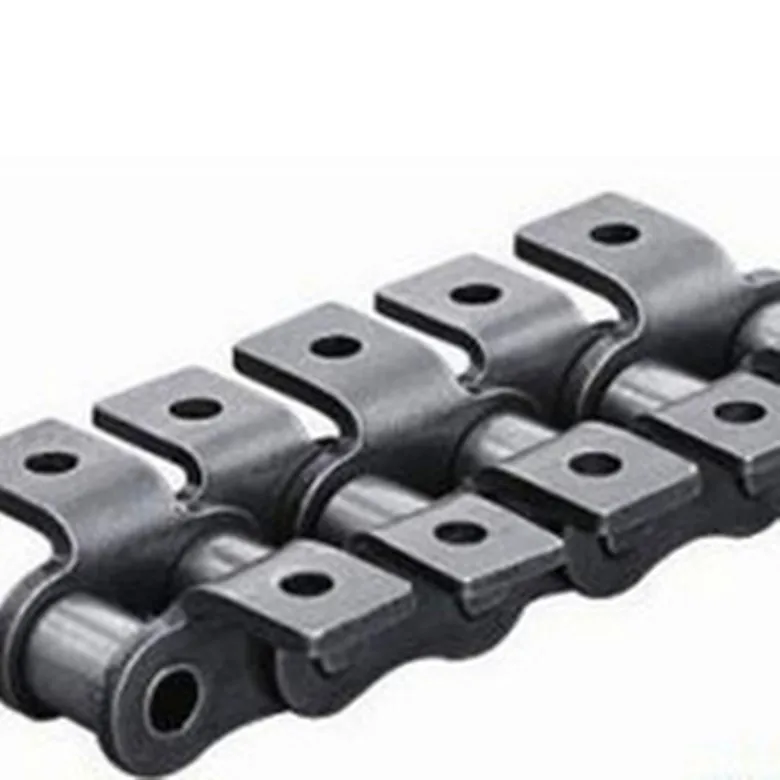 Short pitch conveyor chain with attachments La cadena de transporte