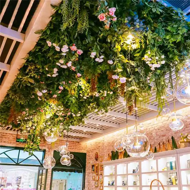 Wholesale Plastic Plant Faux Fern Leaf Garland Greenery indoor outdoor Ceiling Decor Artificial Grass Wall Hanging Plants
