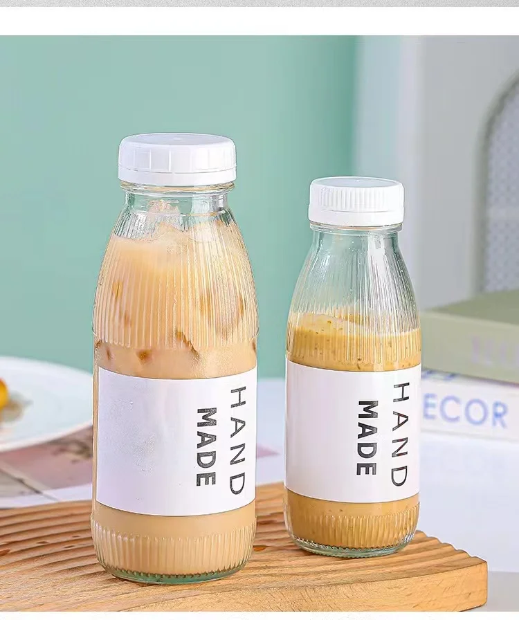 Hot Selling 300ml 500ml Clear Glss Bottle With Lids With Anti-theft Cover