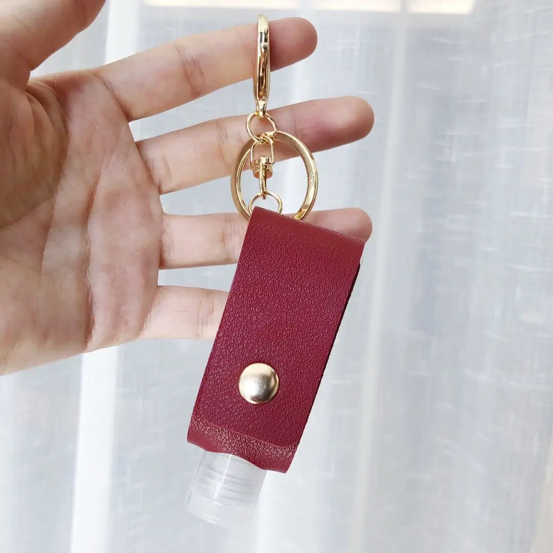 Xinxing New Empty sanitizer bottles  Keychain Holder Reusable Lotion Squeeze Tube Soap Containers Leather Pouches Accessories